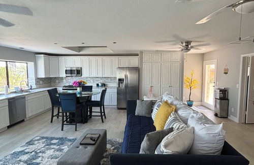 Lakeland Village House | Amazing, Lakeside Pickleball Retreat with 2 courts swim spa & outdoor kitchen