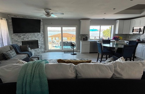 Lakeland Village House | Amazing, Lakeside Pickleball Retreat with 2 courts swim spa & outdoor kitchen
