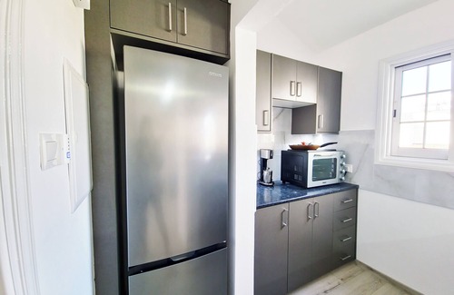 Oroklini Apartment | Amazing location, surrounded by palm trees and just 200 meters from the beach!