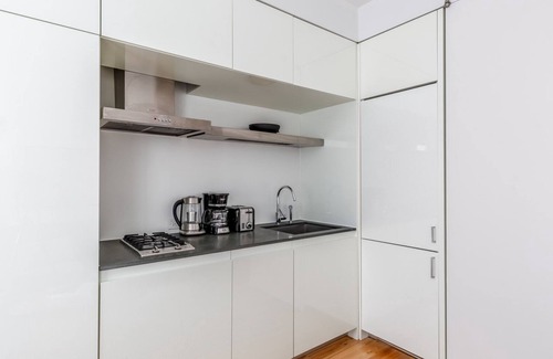 Central New York City Apartment | Amazing Midtown 1BR w/Doorman, Gym & W/D, nr Rock Center, by Blueground