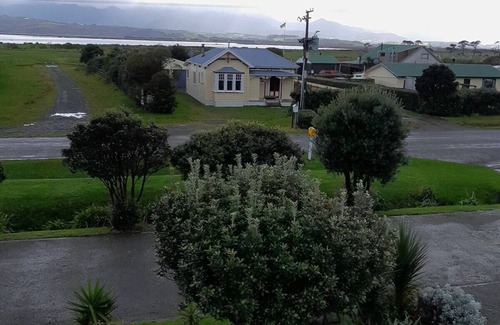 Lake Ferry Cottage | Amazing recently renovated cozy cottage, oozing both character and comfort.
