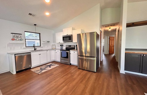 Colington Harbour House | Amazing sunsets, hot tub, community pool, 3 bed 2 bath. Dog friendly!