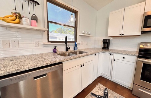 Colington Harbour House | Amazing sunsets, hot tub, community pool, 3 bed 2 bath. Dog friendly!