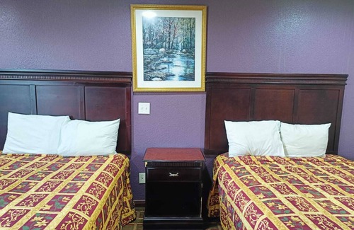 Victoria Hotel | American Inn & Suites By Capital O Victoria US-59