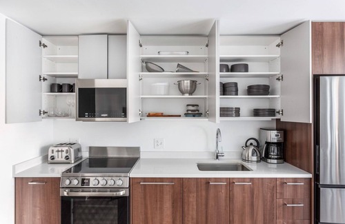 Central Square Apartment | Ample Central Square 1BR w/Gym, Doorman, Roof Deck