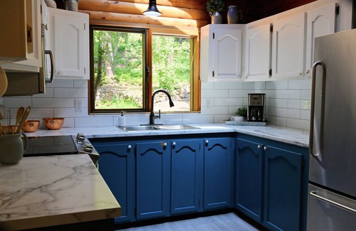 Vernon House | An Incredible log house just 15 mins from the hill that sit on 5 wooded acres!