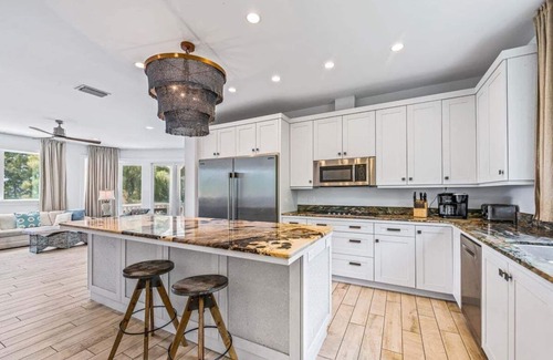 Bradenton Beach House | Anna Maria Grand: Gulf Front! On the Beach! Sleeps 22 by Anna Maria Life Vacation Rentals
