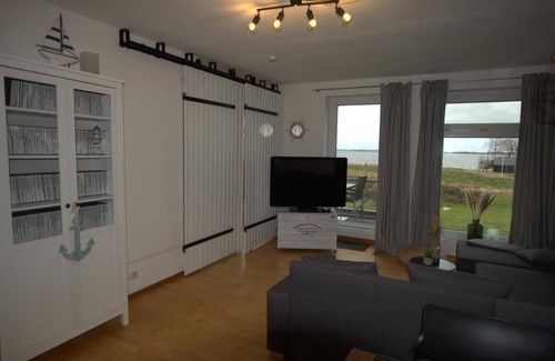 Lembruch Apartment | Anteros Dümmerblick Ferienwohnung mit Traumhaften Seeblick