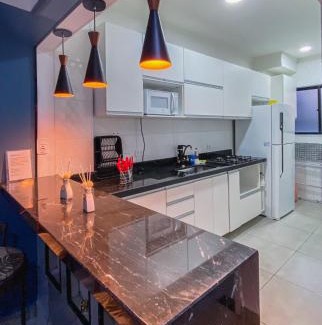Enseada Apartment | APÊ COM PISCINA E AR - 2Q DA PRAIA DA ENSEADA.