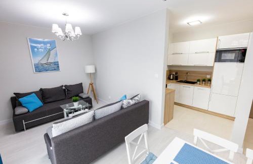 Rewal Apartment | Apartament 7M z Basenem w jednym budynku Rewal, free private parking, Park rozrywki HOSSOLAND 30 minut