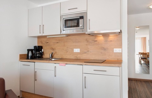 Immenstaad am Bodensee Apartment | Apartment 'Typ A2 2 Obergeschoss Nummer 13' with Shared Terrace, Shared Garden and Wi-Fi