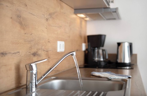 Immenstaad am Bodensee Apartment | Apartment 'A1 1 Obergeschoss Nummer 12' with Shared Terrace, Shared Garden and Wi-Fi