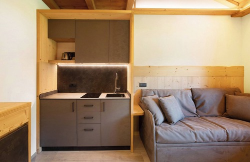 Livigno Apartment | Apartment 'Agriturismo Bosco D'oro 2' with Mountain View, Shared Garden and Wi-Fi