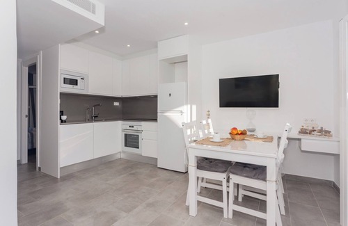 Cala'n Bosch Apartment | Apartment 'Apartamento Annuin' with Shared Pool, Wi-Fi and Air Conditioning