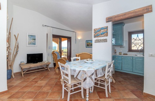 Porto Pollo Apartment | Apartment 'Casa Lauretta' with Sea View, Shared Pool and Air Conditioning
