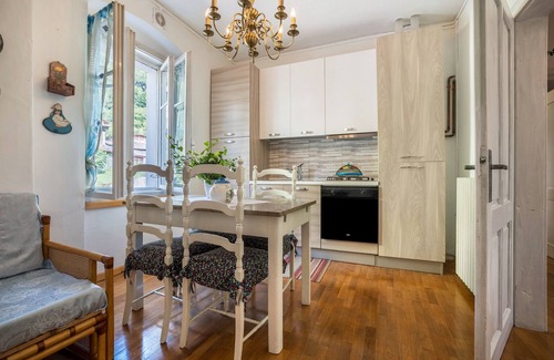 Sella Giudicarie Apartment | Apartment 'Casa Nel Borgo' with Mountain View and Shared Garden