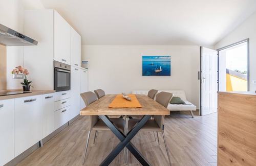 Sant'Antioco Apartment | Apartment 'Casa Vacanze Alba Mar' with Balcony, Wi-Fi and Air Conditioning