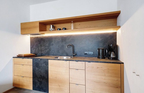 Schenna Apartment | Apartment 'Dahoam - Gardensuite L' with Mountain View, Shared Pool and Wi-Fi