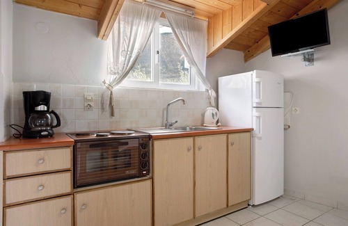 Limni Keri Apartment | Apartment "Dolphin Apartment Sea View 12" with Private Balcony, Shared Garden & Wi-Fi