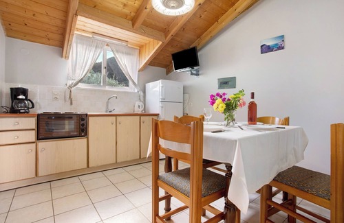 Limni Keri Apartment | Apartment "Dolphin Apartment Sea View 12" with Private Balcony, Shared Garden & Wi-Fi