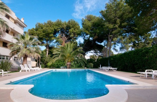 Cala Agulla Apartment | Apartment Drac Blanc 1-4 close to the Beach with Sea View, Pool, Terrace & Wi-Fi