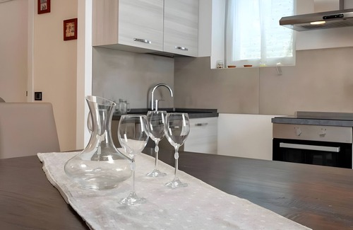 Lido Apartment | Apartment 'Favola Rosa' with Shared Terrace, Wi-Fi and Air Conditioning