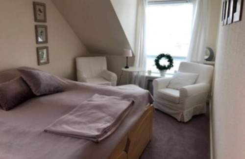 Husby Apartment | Apartment 'Ferienwohnung Moin-moin-husby' with Shared Terrace, Shared Garden and Wi-Fi