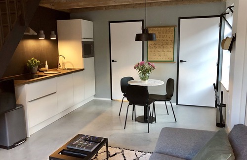 Heerlen Apartment | Apartment for two people in renovated former primary school with lovely garden.