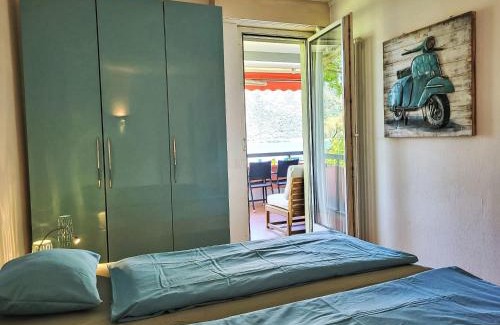 Bissone Apartment | Apartment Frontlake Panorama Apt- 408 by Interhome