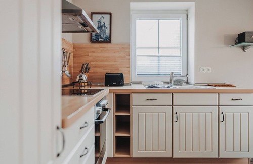 Baltrum Apartment | Apartment 'Gorch Fock' with Shared Terrace, Shared Garden and Wi-Fi