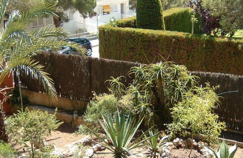 Tamarit Apartment | Apartment in Playa la Mora,with sea views near the beach, privat garden&Pool.