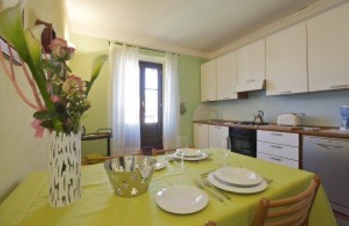 Verbania Apartment | Apartment in Verbania + garden, air/con and WiFi, a few steps from Lake Maggiore