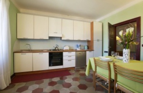 Verbania Apartment | Apartment in Verbania + garden, air/con and WiFi, a few steps from Lake Maggiore