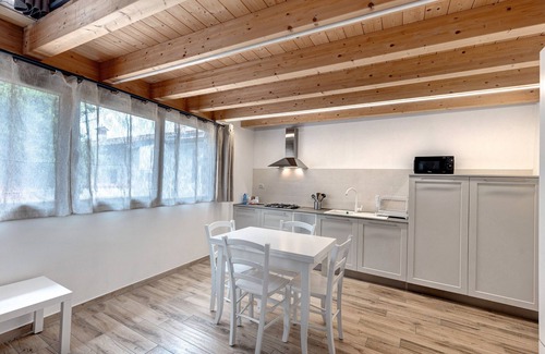 Portese Apartment | Apartment 'Soppalco - Isola Trimelone' with Shared Pool, Wi-Fi and Air Conditioning