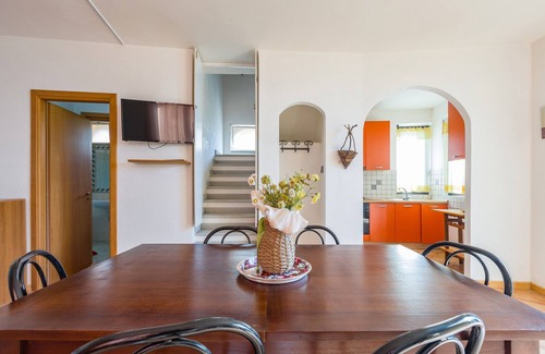 Santo Stefano Apartment | Apartment 'Mandorlo' with Sea View, Private Terrace and Wi-Fi
