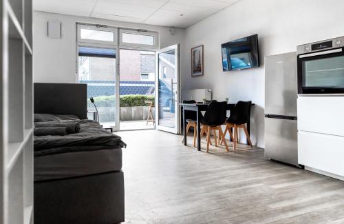 Goch Apartment | Apartment mit vier Einzelboxspringbetten - Netflix