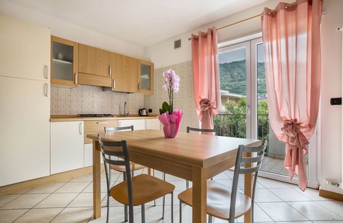 Torbole sul Garda Apartment | Apartment 'N2 Appartamento Rosa' with Mountain View, Shared Garden and Balcony