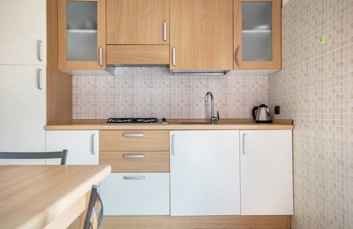 Torbole sul Garda Apartment | Apartment 'N2 Appartamento Rosa' with Mountain View, Shared Garden and Balcony