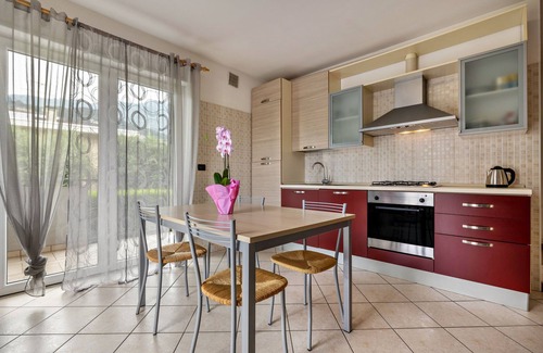 Torbole sul Garda Apartment | Apartment 'N4 Appartamento Blu' with Mountain View, Shared Garden and Balcony
