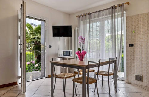 Torbole sul Garda Apartment | Apartment 'N4 Appartamento Blu' with Mountain View, Shared Garden and Balcony