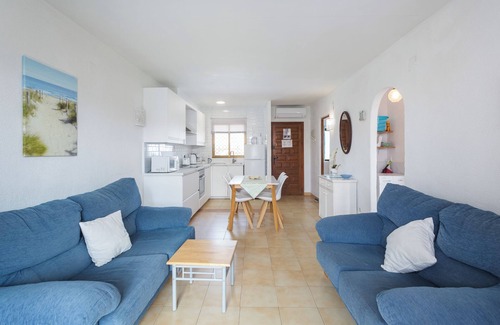 Les Deveses Apartment | Apartment 'Nueva Playa A8' with Sea View, Wi-Fi and Air Conditioning
