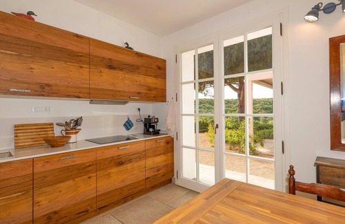 Riparbella Apartment | Apartment 'Podere Terraviva - Apt Ginestra' with Sea View, Shared Pool and Wi-Fi