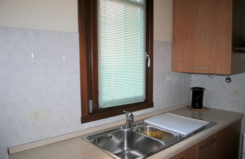 Manerba del Garda Apartment | Apartment 'Poggio Al Sole' with Shared Pool, Wi-Fi and Air Conditioning