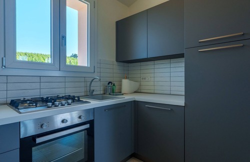 Aglientu Apartment | Apartment 'Sughereto 1' with Sea View, Wi-Fi and Air Conditioning