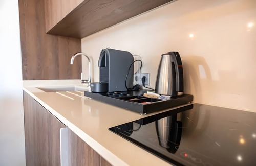 Cala Agulla Apartment | Apartment 'Suite 2' in a Hotel with Shared Pool, Wi-Fi and Air Conditioning