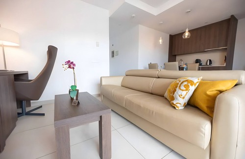 Cala Agulla Apartment | Apartment 'Suite 3' with Shared Pool, Wi-Fi and Air Conditioning
