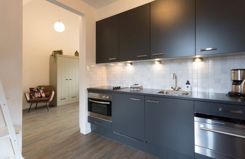 Oostkapelle Apartment | Apartment with balcony on the sunny side, close to nature and beach.