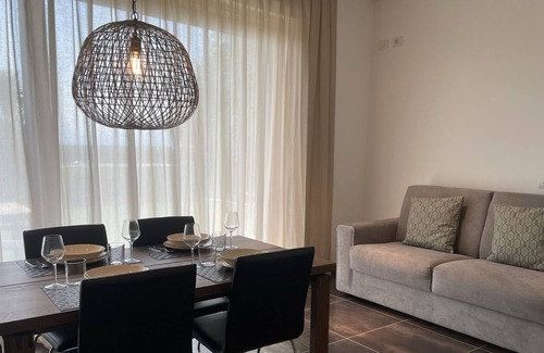 Cisano Apartment | Apartment with direct access to the lake. Garden and private pool!