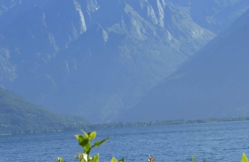 Musso Apartment | Apartment with pool, private garden & private boat mooring at shore lake Como