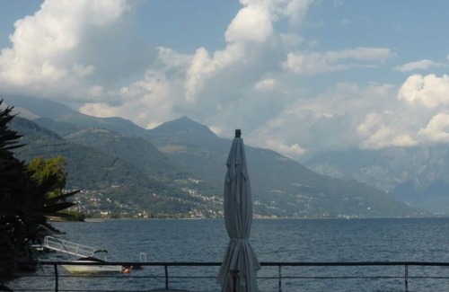 Musso Apartment | Apartment with pool, private garden & private boat mooring at shore lake Como